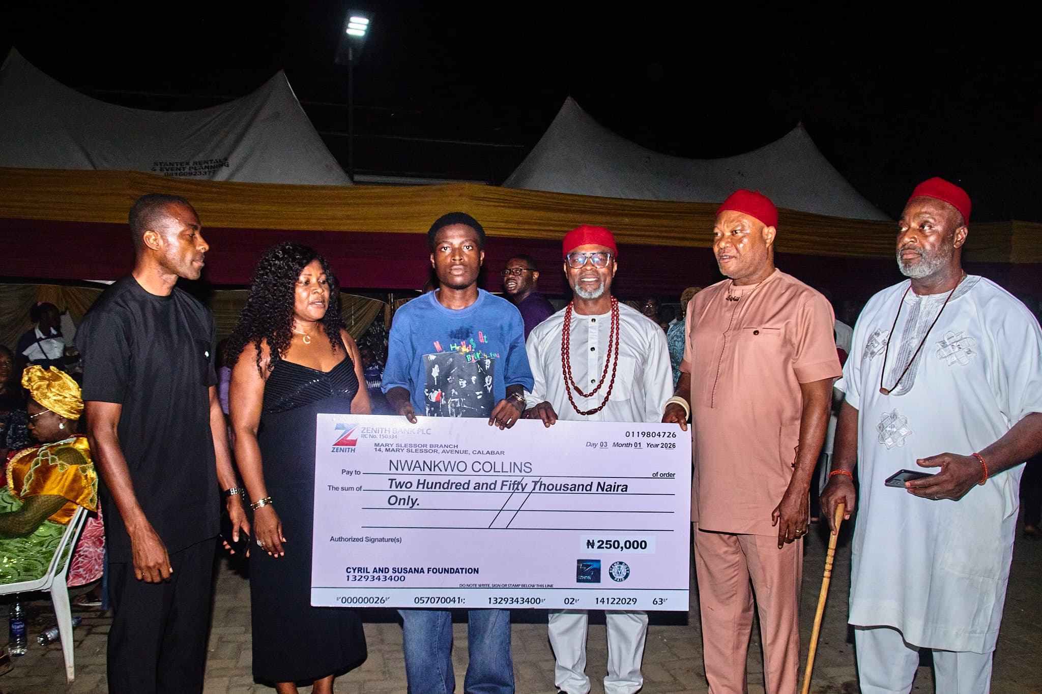 Presentation of award by Chief Ezennolim (Ajofia)