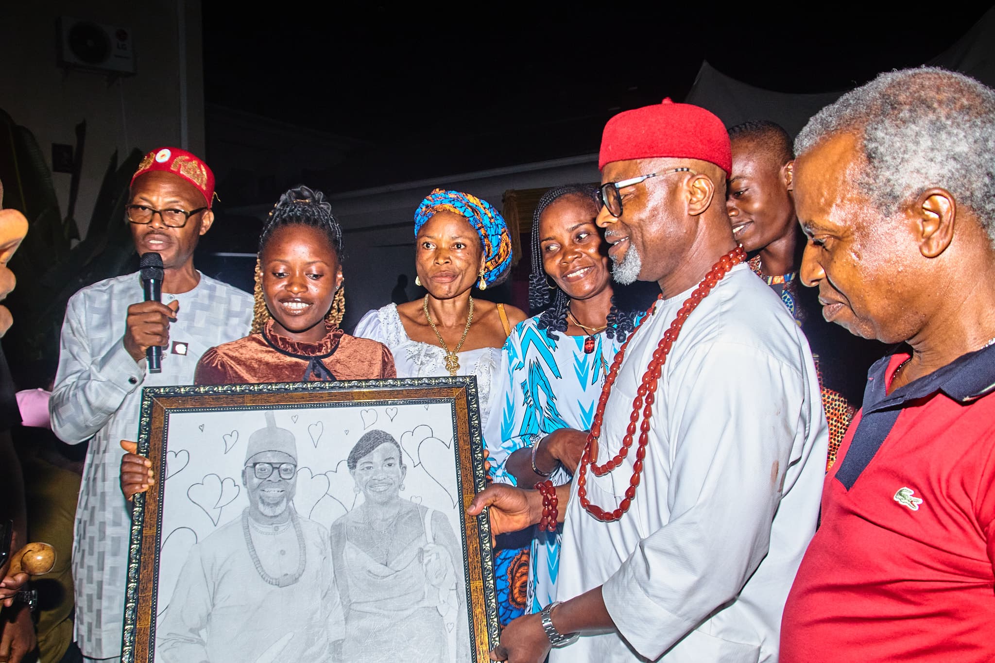 A Beneficiary presents an Art Work to the sponsor